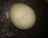 A picture of step 11 of Dinner rolls.