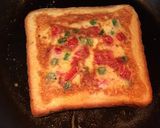 A picture of step 7 of Cheese Tomato Egg Toast.