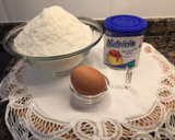 Foto del paso 1 de la receta: Delicias de coco con esencia de almendra