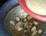 A picture of step 4 of Chicken qorma.