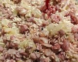 Foto del passaggio 3 della ricetta Risotto al radicchio con salsiccia e asiago