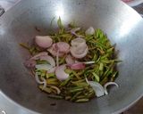 A picture of step 2 of Lau Khosa Posto Bhaja aka Roasted Bottle Gourd Peel.