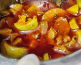 A picture of step 7 of Khatta Meetha Amla Pickle.