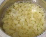 A picture of step 1 of Cheesy macaroni in white sauce.