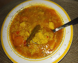 Foto del paso 4 de la receta: Arroz meloso de pollo y lomo - rápido y fácil