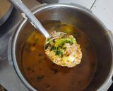 A picture of step 4 of Kathiyawadi Masala Khichdi.