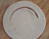 A picture of step 12 of Cheesy Ring Packets.