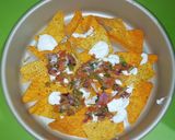 A picture of step 5 of Loaded Cheesy nachos.