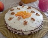 Foto del passaggio 2 della ricetta Torta al cacao noci, pesche e panna