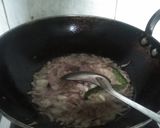 A picture of step 1 of Brinjal Masal-e-daar.