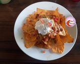 A picture of step 6 of Fireless Cheese Nachos.