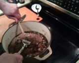 A picture of step 21 of Braised beef over egg noodles/pot roast.