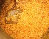 A picture of step 4 of Fried rice an chicken.