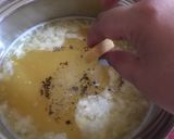 A picture of step 3 of Oriental egg-drop sweet corn soup.