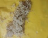 A picture of step 5 of Surul /churul appam (coconut crepe roll).