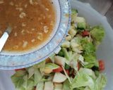 A picture of step 4 of Mix Veggies salad 🥗 with orange 🍊 dressing.