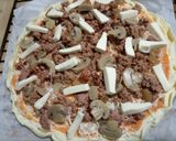 Foto del paso 4 de la receta: Pizza hojaldre de sobras de los tomates rellenos