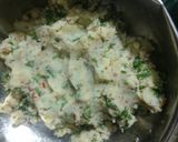 A picture of step 2 of Aaloo ka paratha(potato flat bread) with mint chutney.