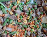 A picture of step 3 of Veg Biryani(lots of vegetables in one dish appealing one).