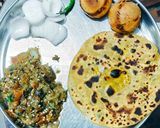 A picture of step 10 of Sattu parantha with bharta.