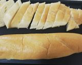 A picture of step 2 of Cheesy Garlic Bread.