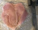A picture of step 4 of Rolled smashed chicken with ham and cheese.