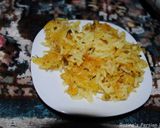 A picture of step 10 of Persian mung beans rice.
