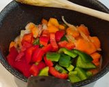 Foto del paso 6 de la receta: Rollitos de pollo en salsa de pimientos, zanahorias y queso crema