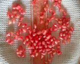 A picture of step 2 of Pomegranate and coconut flakes Dark chocolate bark.