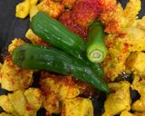 A picture of step 6 of Tawa chicken.