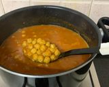 A picture of step 7 of Chana Paneer with Kasoori methi flavoured Bhaturas.