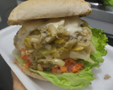 Foto del paso 12 de la receta: Sándwich con muchos vegetales y pollo🥙🥯🧅🍆🍗🥪