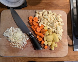A picture of step 1 of Spiced parsnip soup.
