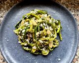 A picture of step 6 of Zucchini Spaghetti with Basil Pesto, Crumbled Feta, Almonds, and Pine Nuts.