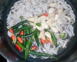 A picture of step 1 of Gobhi (cauliflower) with chicken.