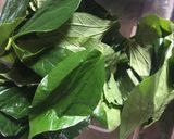 A picture of step 1 of Fried Beef Wrapped in Betel Leaves.