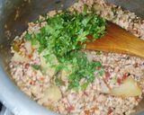 A picture of step 6 of Aloo Qeema.