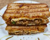 A picture of step 6 of Cheesy Sandwich with potato and green peas filling.