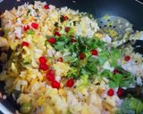 A picture of step 4 of Poha with Potatoes Peas and Pomegranate.