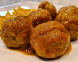 A picture of step 10 of Spanish-Style Meatballs in Sauce.