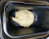 Foto del paso 2 de la receta: Pan de molde con naranja y chocolate (en panificadora y molde con tapa)