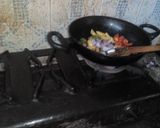 A picture of step 13 of Mach e vat e bangali-a lunch thali.
