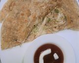 A picture of step 7 of Cheesy chicken paratha 😋😋😋.