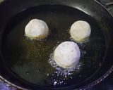 A picture of step 4 of Ranga Aloor Puli Pithe or Sweet Potato Fried Dumplings.