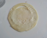Foto del paso 7 de la receta: Pastelitos de hojaldre rellenos con natillas y ciruelas en almíbar