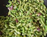 A picture of step 2 of Long beans poriyal.
