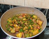 A picture of step 7 of Shimla mirch aloo sabzi.