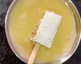 A picture of step 5 of Bread Eggs Lollipop French Toast.