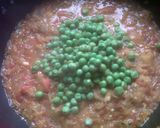 A picture of step 11 of Baigan ka bharta with peas.