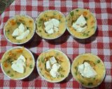 Foto del passaggio 5 della ricetta Tortini patata piselli e carota filanti